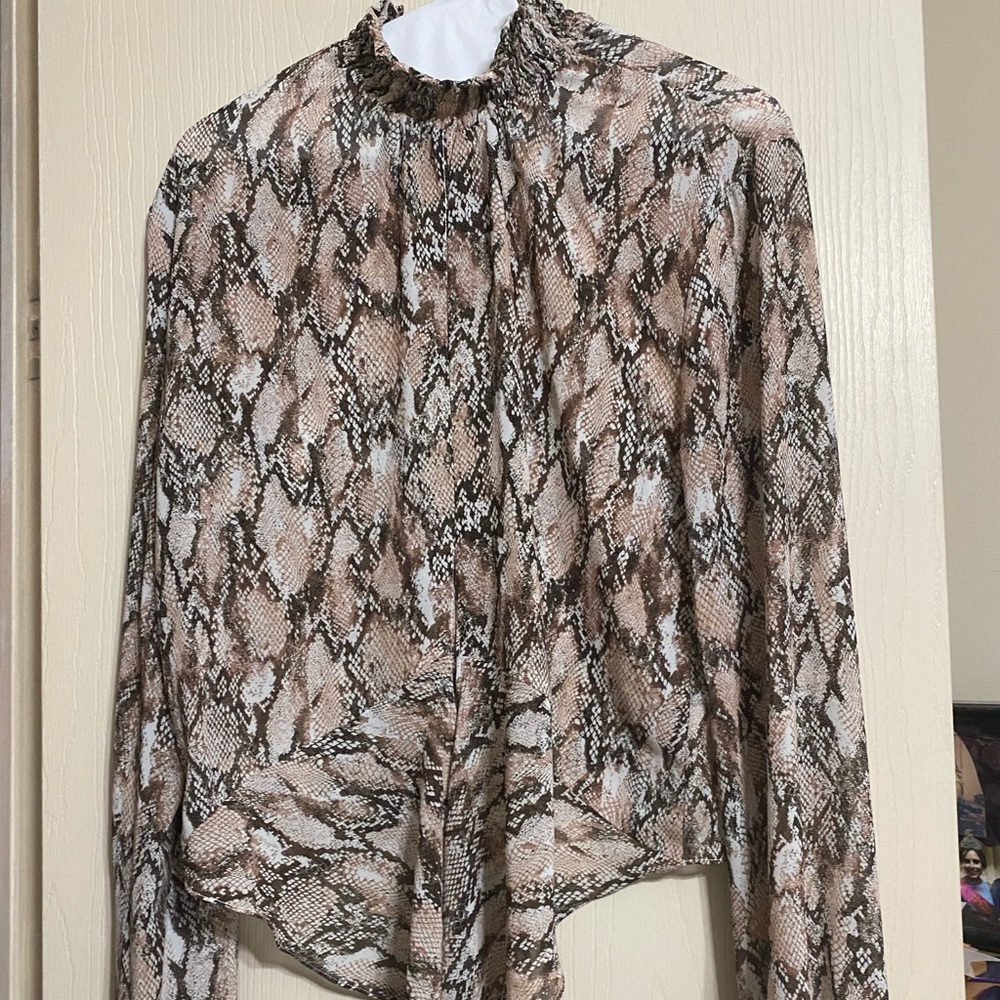 Snakeskin turtleneck blouse